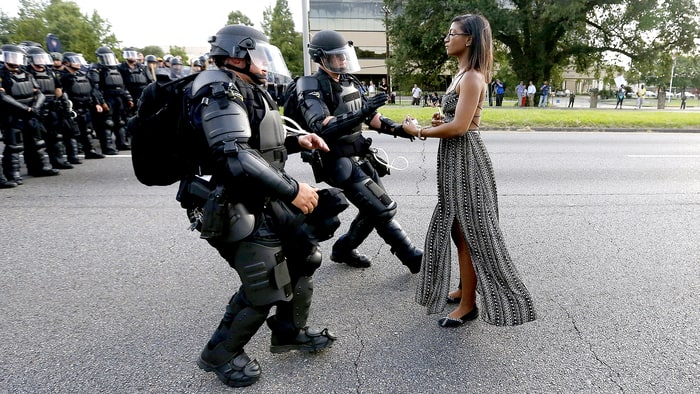 [Ieshia Evans protesting the shooting death of Alton Sterling is detained by law enforcement near the headquarters of the Baton Rouge Police Department in Baton Rouge, LA, on July 9, 2016.]